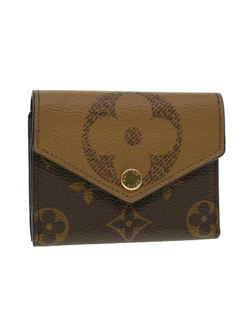 Monogram Reverse Trifold Wallet