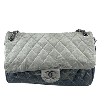 Elegant Leather Flap Bag with Dust Bag and Iconic Craftsmanship