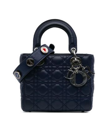 Quilted Leather Handbag with Detachable Strap and Interior Zip Pocket