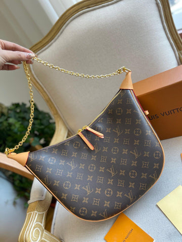 LV TAMBOURIN MONOGRAM 099