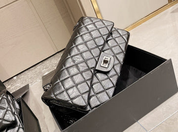 Designer bags by Chanel 050