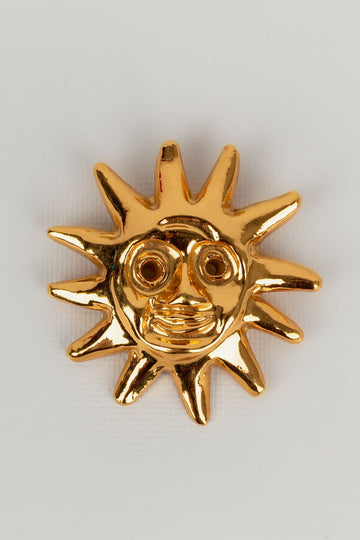 Broche soleil Christian Lacroix