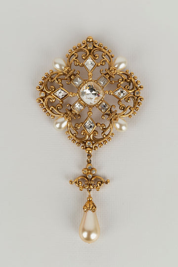 Imposante broche dorée Dior