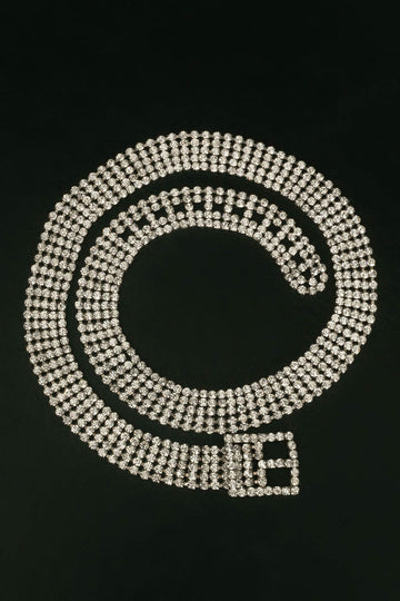 Ceinture en métal argenté pavée de strass.
