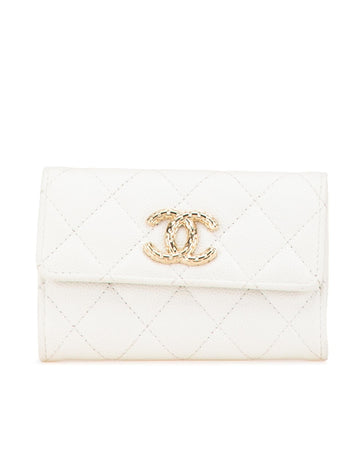Quilted Leather Compact Flap Wallet with Snap Closure and Interior Slip Pockets