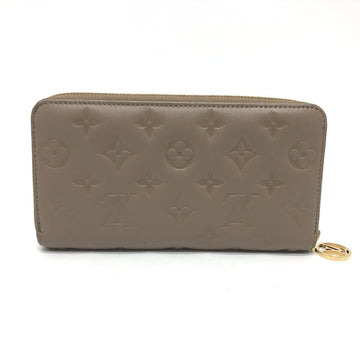 LOUIS VUITTON Long Wallet Purse M81511 leather Beige type Monogram emboss Zippy wallet Women Used