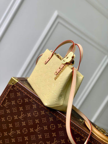 M24144 SMALL Reade Monogram Vernis Handbag lemon yellow