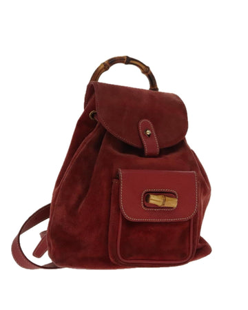 Suede Backpack with Bamboo Handle and Gold Accents