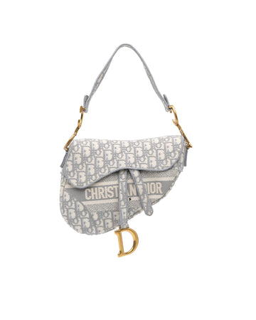 Embroidered Canvas Saddle Bag with Leather Trim and Magnetic Closure