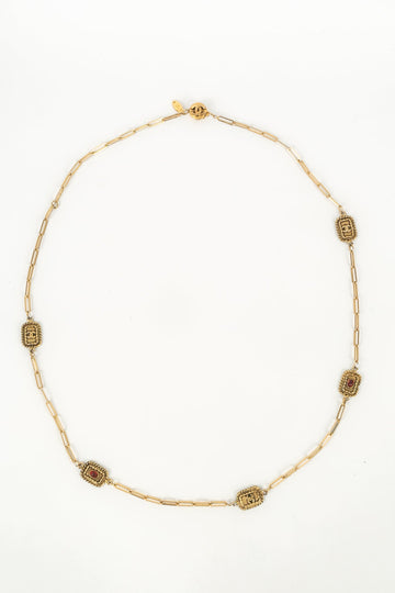 Collier doré Chanel 1984