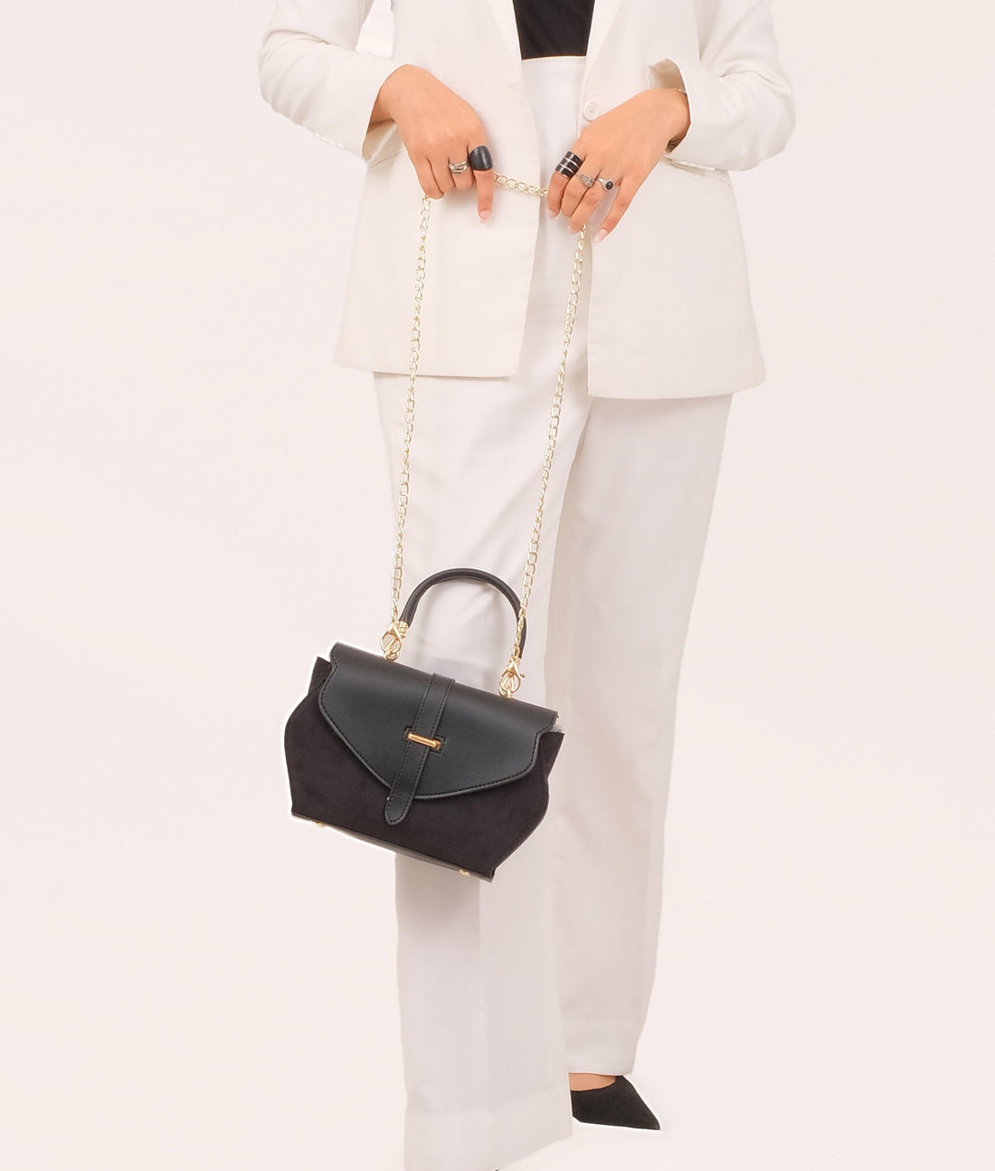 Black top-handle hexagon bag