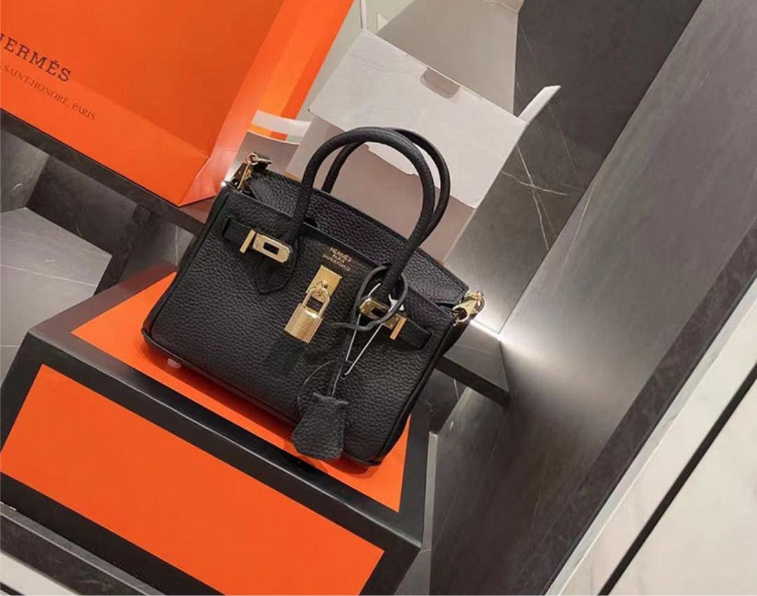 Leather HMS woman shoulder handbag