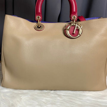 Dior Beige Leather Tote Bag with Red Handles and Gold Hardware