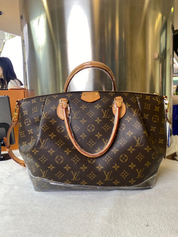 Louis Vuitton Monogram Canvas Artsy Bag Brown