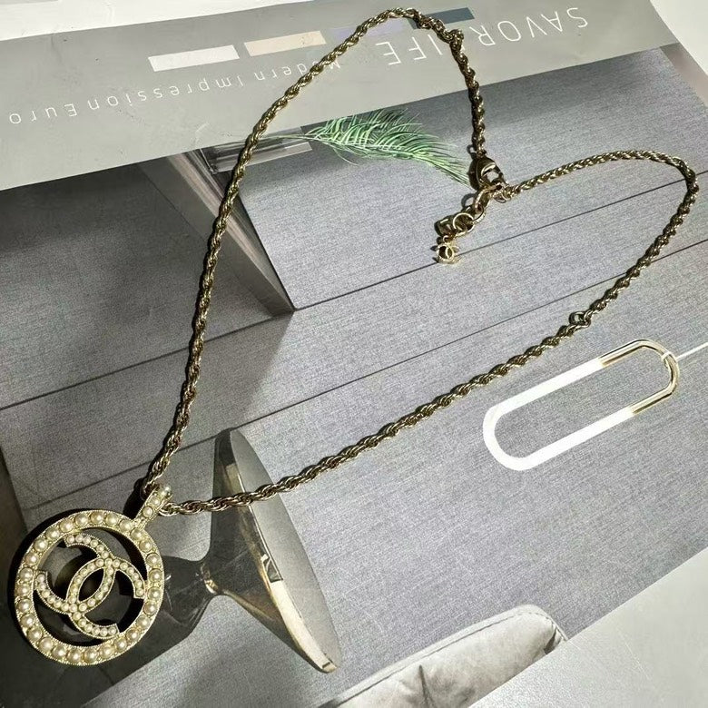 Chanel Gold-Tone CC Logo Pearl Pendant Necklace