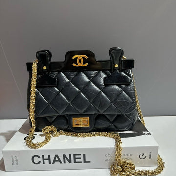 Preloved Chanel Clip Bag Small Black Quilted Leather