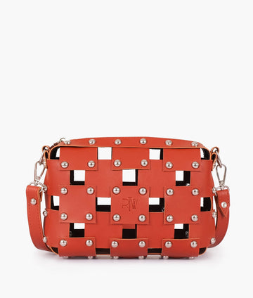 Rust rivet cross-body bag
